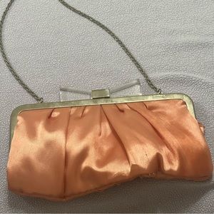 Small light pink handbag